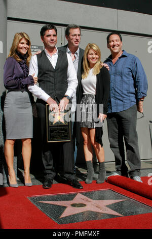 Lori Laughlin, John Stamos , Bob Saget and Candace Bure at the Hollywood Chamber of Commerce ceremony to honor John Stamos with the 2,393rd star on the Hollywood Walk of Fame on Hollywood Blvd. in Hollywood, CA, November 16, 2009. Photo by Picturelux File Reference # 30102 35PLX   For Editorial Use Only -  All Rights Reserved Stock Photo