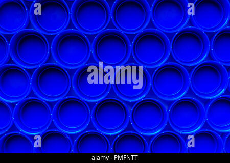 Recycled blue plastic bottle caps, top view Stock Photo