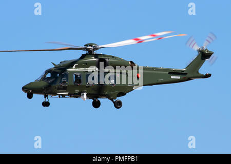 AgustaWestland (Leonardo) AW149 military helicopter of the Italian Air force flying in the sky Stock Photo