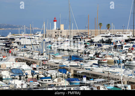 Menton, France - September 16, 2018: Panoramic View Of Port Garavan In Menton On The French Riviera, Red And White Lighthouse With Many Yachts And Boa Stock Photo