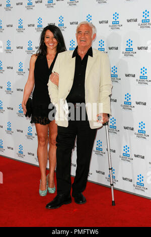 Jean-Paul Belmondo with his girlfriend Barbara Gandolfi at the 2010 TCM Classic Film Festival World Premiere of the newly restored 1954 film, 'A Star is Born'. Arrivals held at Grauman's Chinese Theatre in Hollywood, CA on Thursday, April 22, 2010. Photo by PictureLux File Reference # 30190 055PLX   For Editorial Use Only -  All Rights Reserved Stock Photo