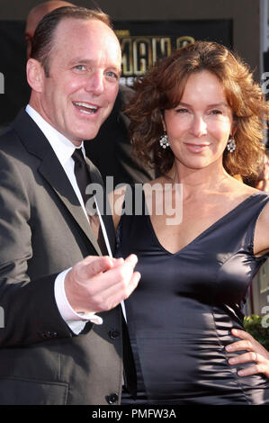 Clark Gregg and Jennifer Grey at the World Premiere of 'IRON MAN 2' held at the El Capitan Theatre in Hollywood, CA on Monday, April 26, 2010. Photo by Pedro Ulayan Gonzaga Pacific Rim Photo Press File Reference # 30201 077PLX   For Editorial Use Only -  All Rights Reserved Stock Photo