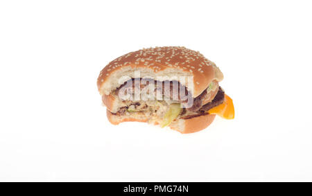 McDonald’s Big Mac burger with 2 beef patties, special sauce, lettuce and cheese on sesame seed bun and a bite taken out Stock Photo