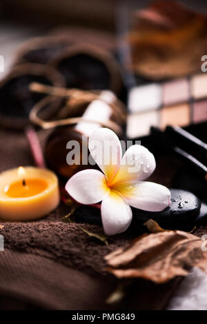 spa setting wirh make up on towel Stock Photo