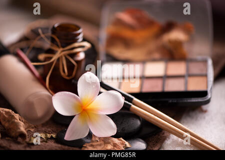 spa setting wirh make up on towel Stock Photo