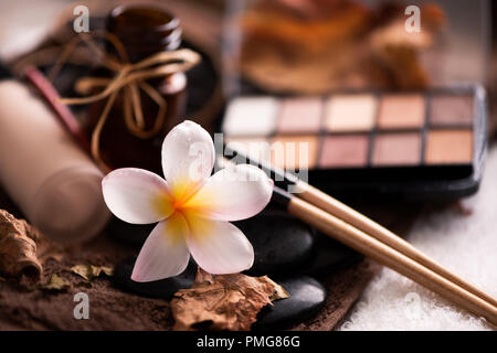 spa setting wirh make up on towel Stock Photo