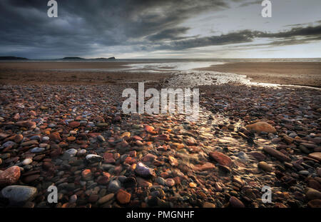 Pebbles on Rhossili Beach Stock Photo