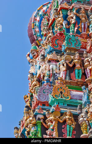 MEENAKSHI TEMPLE MADURAI TAMIL NADU INDIA  STATUE DETAIL ON THE SIDE OF A TEMPLE TOWER Stock Photo
