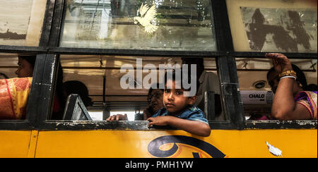 (180918) -- KOLKATA, Sept. 18, 2018 (Xinhua) -- Passengers take a bus in Kolkata, India, on Sept. 18, 2018. Bus transportation is still an important means of public transportation in India. (Xinhua/Tumpa Mondal) Stock Photo