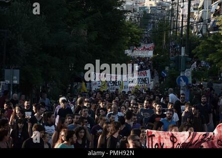 Athens, Greece. 18th Sep, 2018. Protesters seen matching on the street while holding banners during the clashes.Protest and clashes against the murder and marking the fifth anniversary of Pavlos Fyassas, who was short by neo-Nazi in the port city of Piraeus. Credit: Giorgos Zachos/SOPA Images/ZUMA Wire/Alamy Live News Stock Photo