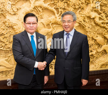 Beijing, China. 17th Sep, 2018. Chinese Vice Premier Hu Chunhua (R) meets with Mongolian Deputy Prime Minister Ulziisaikhan Enkhtuvshin in Beijing, capital of China, Sept. 17, 2018. Credit: Huang Jingwen/Xinhua/Alamy Live News Stock Photo