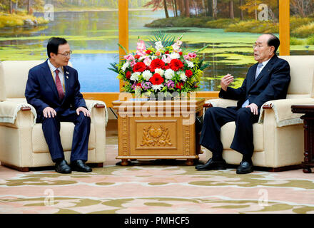Pyeongyang, North Korea. 19th Sep 2018. The President of the Presidium of the Supreme People's Assembly of North Korea Kim Yong-Nam (R) talks with the chairman of South Korea's ruling Democratic Party (DP) Lee Hae-chan, who was visiting the North accompanying South Korean President Moon Jae-in, at the Mansudae Assembly Hall in Pyongyang, North Korea. Credit: Aflo Co. Ltd./Alamy Live News