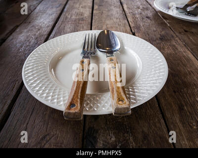 Dirty and empty dishes after meal finish Stock Photo