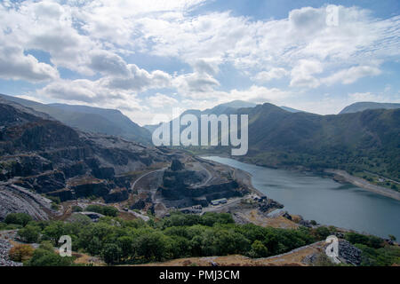 Looking across Dinorwig Quarry and Llyn Peris lake towards Snowdonia Stock Photo