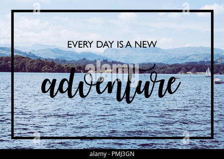 Every day is a new adventure - Lake Windermere black text Stock Photo