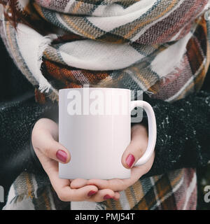 A female hand holding coffee cup, blank - Stock Illustration