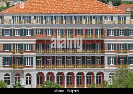 Colonial Style Balconies Facade at Old Hotel Building Stock Photo