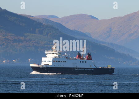 MV Argyle, a passenger ferry operated by Caledonian MacBrayne on the Firth of Clyde, passing the coastal town of Gourock in Inverclyde.. Stock Photo