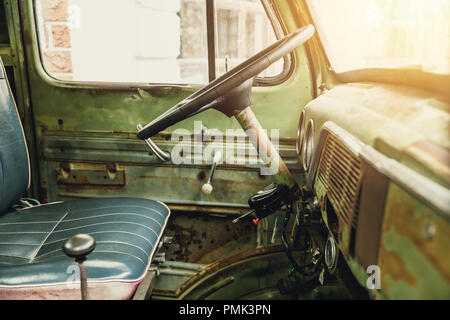 side view of interior old vintage car steering wheel Stock Photo