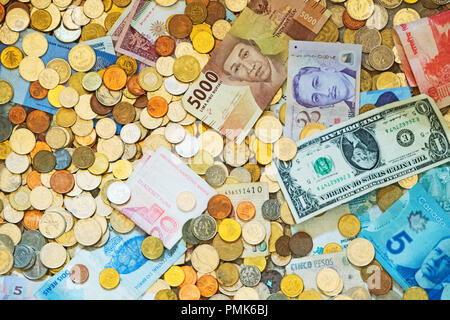 Lots of different money. Banknotes and coins. Stock Photo
