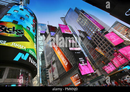 New York, USA – August 24, 2018: Crowded with many people walking Times Square with huge number of LED signs, is a symbol of New York City in Manhatta Stock Photo