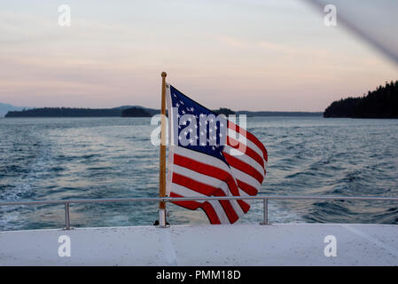 American flag on the back of a boat, San Juan Islands, Washington, United States Stock Photo