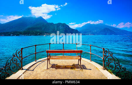 Bench on lakefront in Como Lake landscape. Bellagio Italy Europe Stock Photo