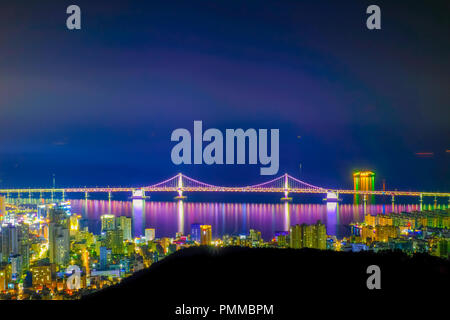 Aerial view of Busan city with Gwangan bridge at nighttime, South Korea. Stock Photo