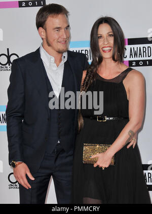 Alanis Morissette and Rapper Mario 'Souleye' Treadway at the arrivals