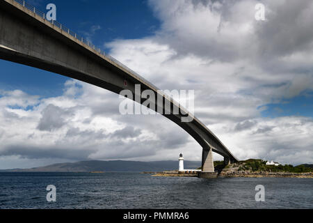 Skye Bridge over Kyle Akin Channel of Inner Sound to Loch Alsh and Eilean Ban Island with white Kyleakin lighthouse and cottages Scotland Stock Photo