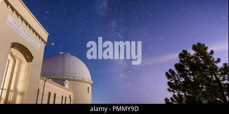 Night view of the historical Lick Observatory; Starry sky and the Milky Way visible in background; San Jose, California; long exposure Stock Photo