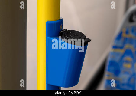USB power socket in a public bus. USB charge for mobile devices on the go Stock Photo