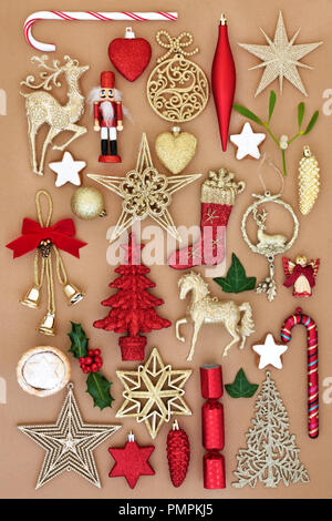 Christmas old fashioned retro ornaments and decorations with food and winter flora on wrapping paper background. Festive card for the holiday season.  Stock Photo