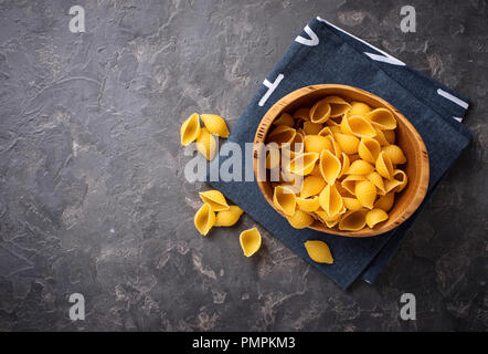 Raw uncooked italian conchiglioni  pasta Stock Photo