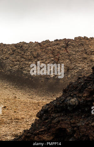 Layers of rocky lava flow from a volcanic eruption on Lanzarote Stock Photo