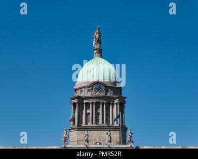 The four figures Mercury wealth industry and Neptune in front of the dome with copper roof and tower clock Stock Photo