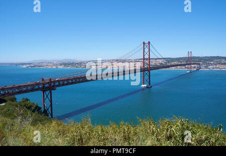 25 of April Bridge (Ponte 25 de Abril) – a suspension bridge over Tagus river. The former named Salazar Bridge it was renamed to commemorates the Carn Stock Photo