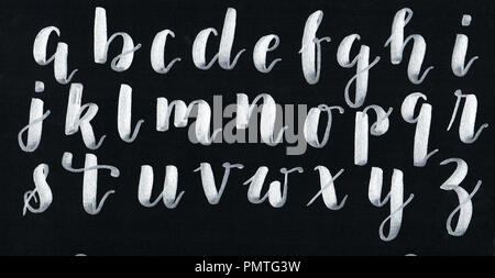 Hand lettering, modern calligraphy alphabet in black on a white paper,  handwritten with a personal font Stock Illustration