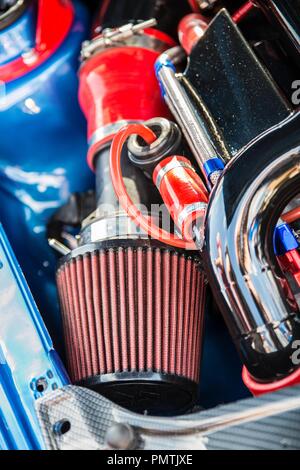 Sport air filter in a gasoline turbocharged car engine. Car tuning
