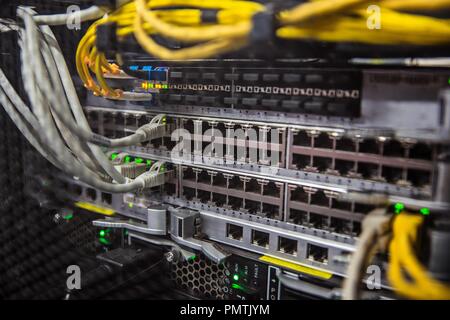 Network server and internet wires. Internet network routers. Wires connected to network interfaces. Internet server Stock Photo