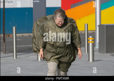 Dundee, Scotland. UK Weather 19/09/2018.  Storm Force Winds hit northern Scotland. Visitors to the city have to endure severe winds with pedestrians being blown over on the seafront promenade. Storm Ali, blow, tempest, flyaway hair, tangled tresses, bad hair day. Credit; MediaWorldImages/AlamyLiveNews. Stock Photo