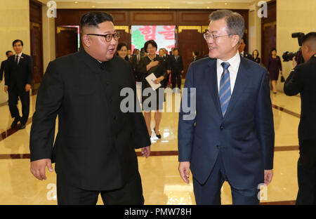 Sep 20, 2018 - Pyeongyang, North Korea - South Korean President Moon Jae-in watched a controversial mass gymnastics performance in Pyongyang late Wednesday on the second day of his trip, alongside North Korean leader Kim Jong-un. As the two leaders entered the May Day Stadium, the venue of the performance, together at about 9 p.m, some 150,000 Pyongyang citizens cheered and gave them an emotional standing ovation. The cheers became louder when Moon waved his hands toward the crowd. (Credit Image: © Pool/Pyongyang Press Corps via ZUMA Wire) Stock Photo