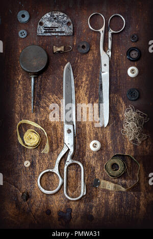 Sewing accessories on wooden table Stock Photo