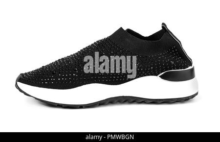 Single new unbranded black sport running shoe, sneakers or trainers isolated on white background Stock Photo