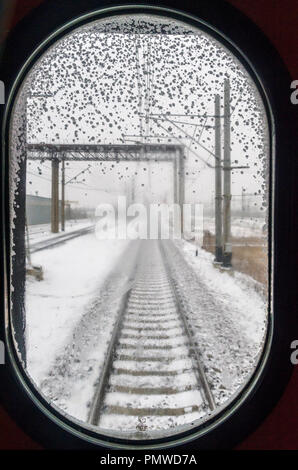 Snowy rail view from Trans Siberian Express' window, Siberia, Russia.