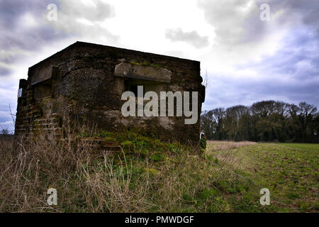 World War II concrete bunker in fields near Barton Bendish, Norfolk, site of former airfield. Stock Photo