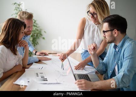Designers working on new project in modern office Stock Photo