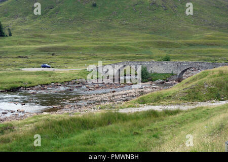 Car Parked at Garva Bridge on the Corrieyairack Pass part of General Wades Military Road on Route to the Scottish Mountain Corbett Meal na h-Arsre. Stock Photo