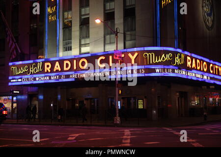 NEW YORK, USA - CIRCA MARCH 2014 - The radio City Music hall at night, featuring Aretha Franklin concerts with led lights. Stock Photo