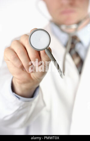 Close up doctor holding stethoscope Stock Photo